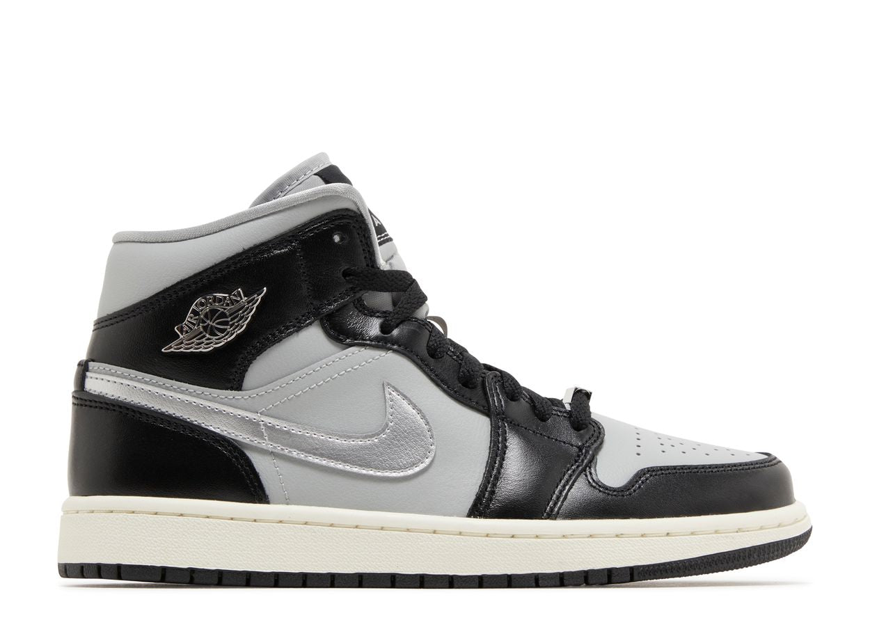 Jordan 1 Mid SE
Noir métallisé argent (femme)