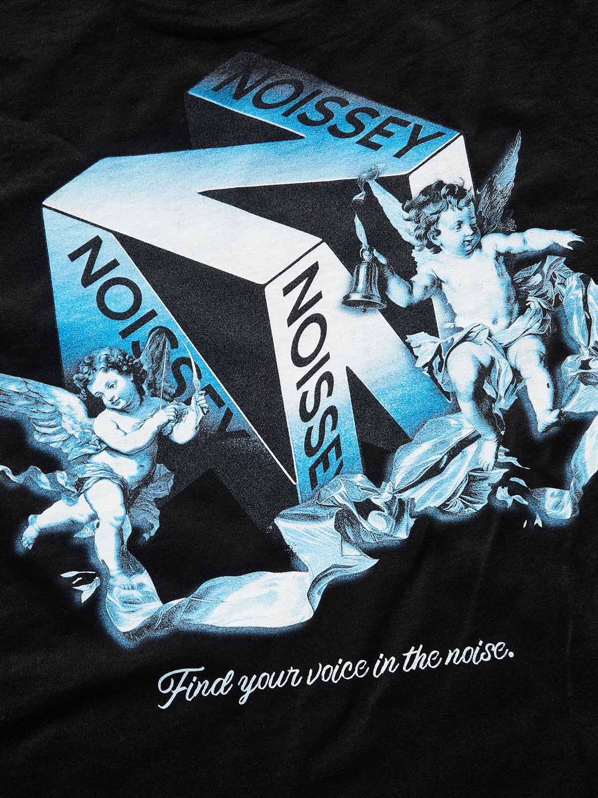 Close-up of the ice-blue cherub and geometric cube print detail on the back of the black t-shirt.