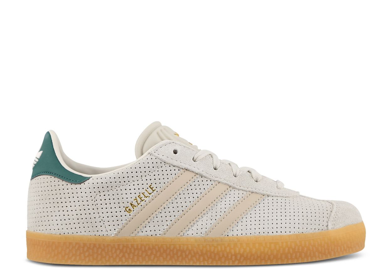 The Adidas Gazelle Wonder Beige Green GS, style IF7156, features perforated beige suede, beige stripes, gold GAZELLE text, a green heel tab with the Adidas logo, and a light brown gum sole, shown in side profile on a white background.