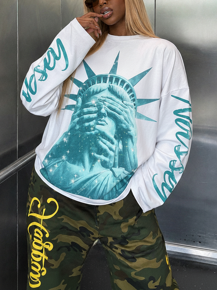 NOISSEY "Liberty Blinded" Teal Diamond Sparkle Graphic Long Sleeve Sweatshirt
