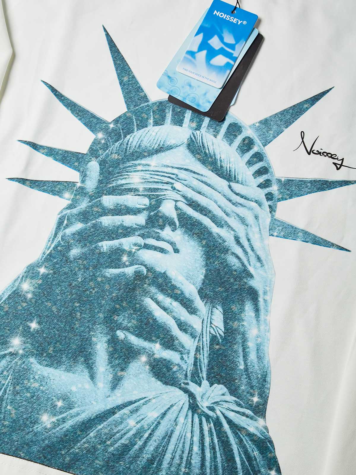 NOISSEY "Liberty Blinded" Teal Diamond Sparkle Graphic Long Sleeve Sweatshirt